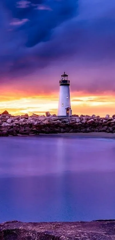 Serene lighthouse at sunset with vibrant violet skies and calm ocean waters.