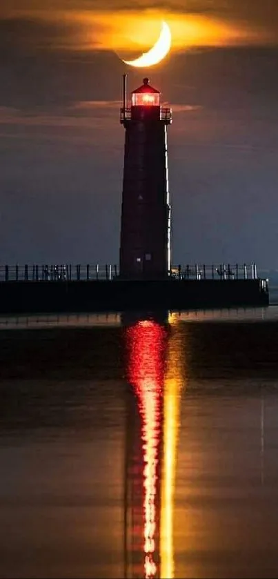 Lighthouse with crescent moon above, reflecting on water at night.