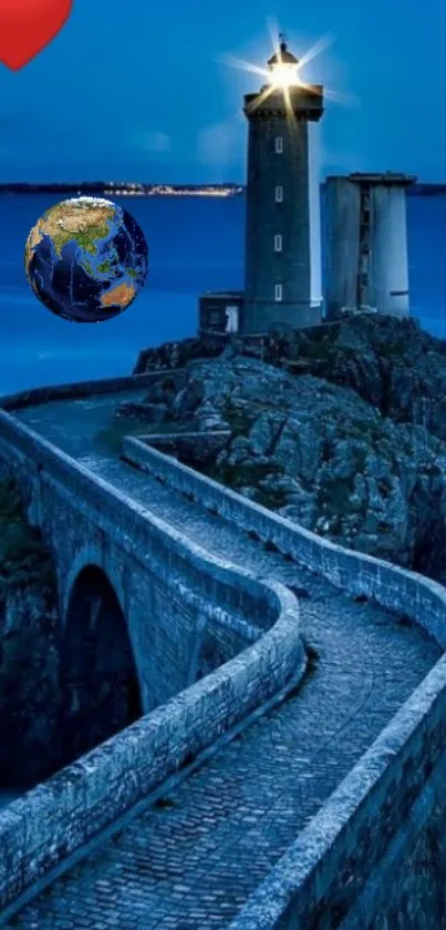 Lighthouse illuminated under a blue night sky with a scenic coastal path.