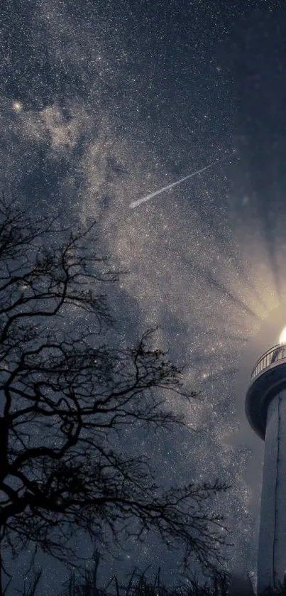 Lighthouse illuminating under starry night sky with tree silhouette.