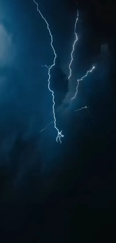 A dramatic lightning bolt cuts through the dark stormy night sky, illuminating the scene.