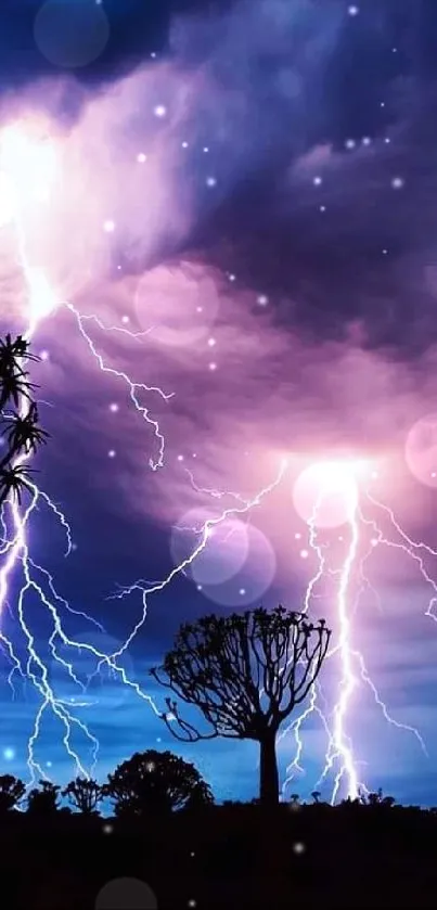 A vivid lightning storm against a purple night sky with silhouetted trees in the foreground.