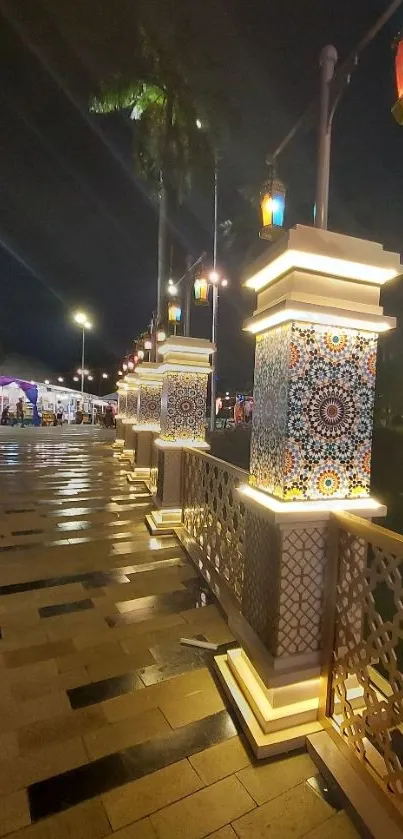 Charming night walkway with lit lanterns and mosaic tiles.