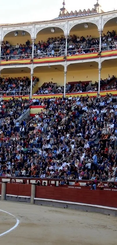 Vibrant Spanish bullring with a full crowd.