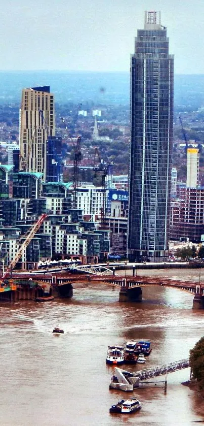 Aerial view of London skyline with river and skyscrapers.