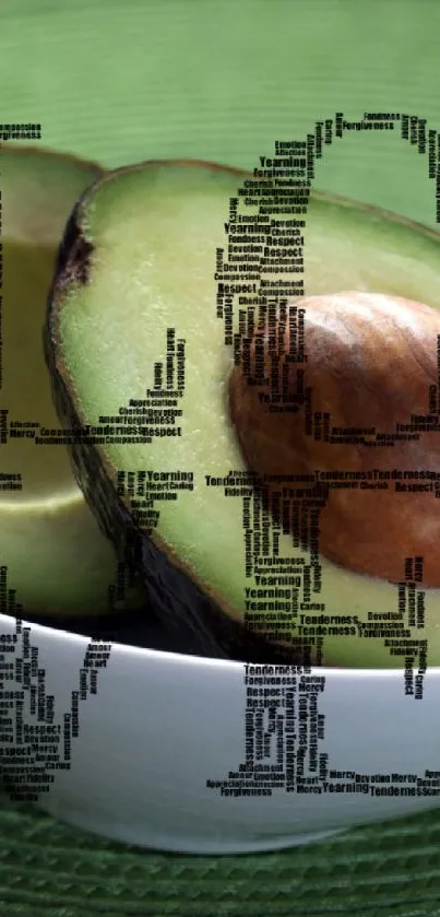 Artistic avocado halves in a bowl with 'LOVE' text overlay on a green mat.