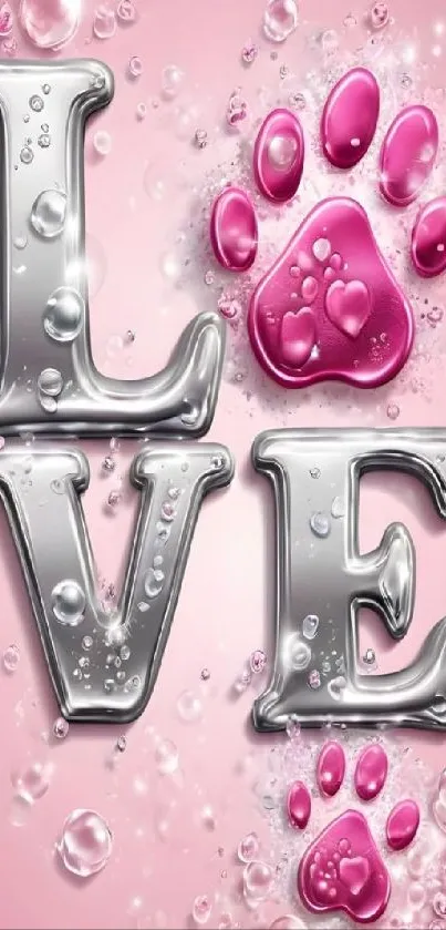 Silver letters spelling love with pink pawprints and bubbles.