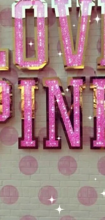 Pink brick wall with 'Love Pink' glowing text and dog heart emblem.