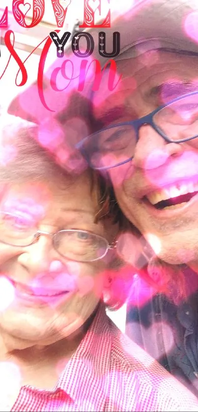 Elderly woman and man smiling with 'Love You Mom' text.