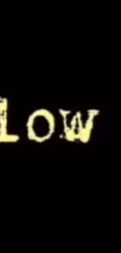 Wallpaper with bold yellow text 'low' on a black background.