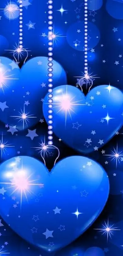 Blue hearts with starry, sparkling background wallpaper.