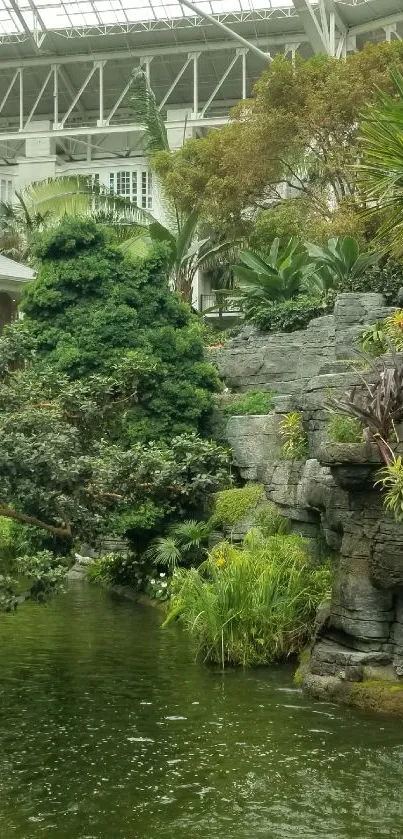 Serene indoor garden with lush greenery and water features.