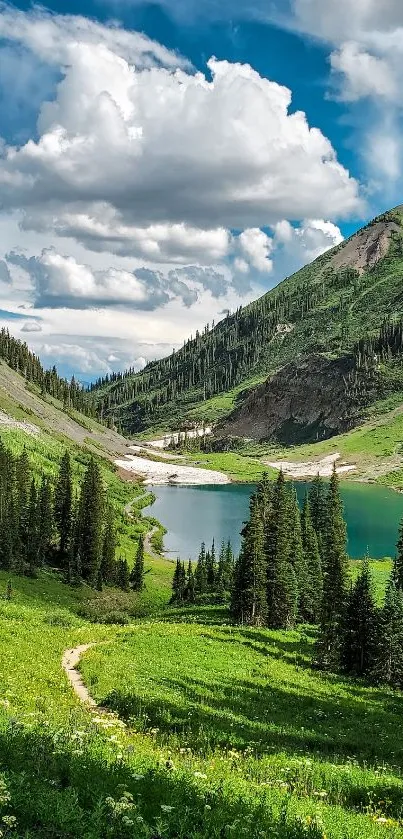 Lush green mountain landscape with clear blue sky and lake.