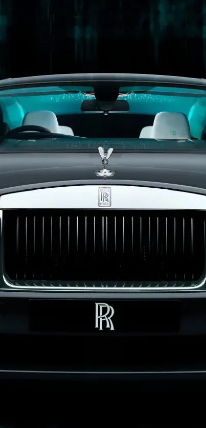 Luxurious black car's front view with elegant design.