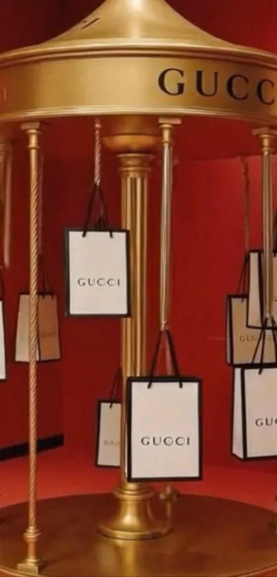 Luxurious Gucci display with gold and shopping bags.