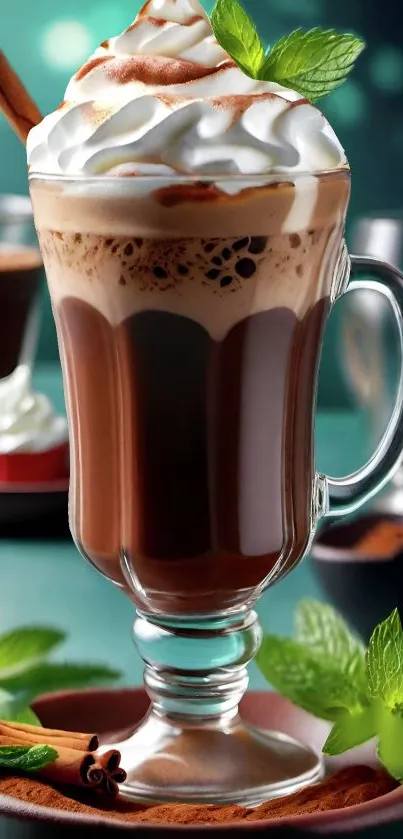 Creamy coffee in a glass mug with mint garnish.