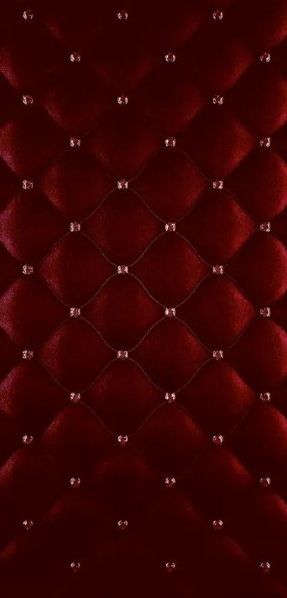 Luxurious red velvet wallpaper with tufted texture.