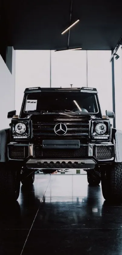 Luxury black SUV in modern showroom interior.