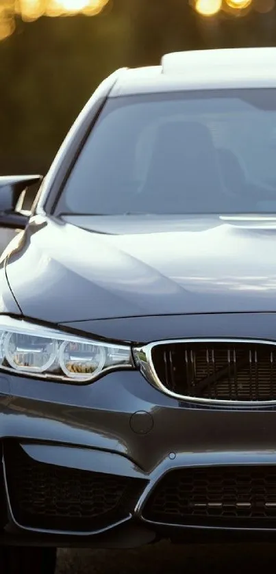 Luxury car front view with sleek gray finish.