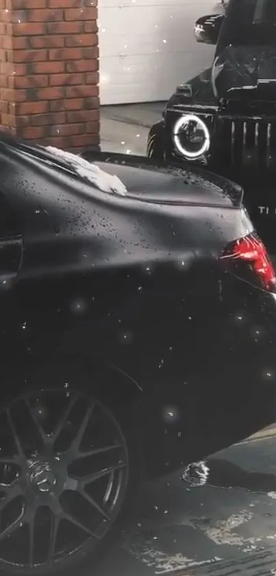 Black luxury cars in a sleek garage backdrop.