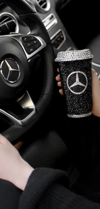 Luxury car interior with a black rhinestone tumbler.