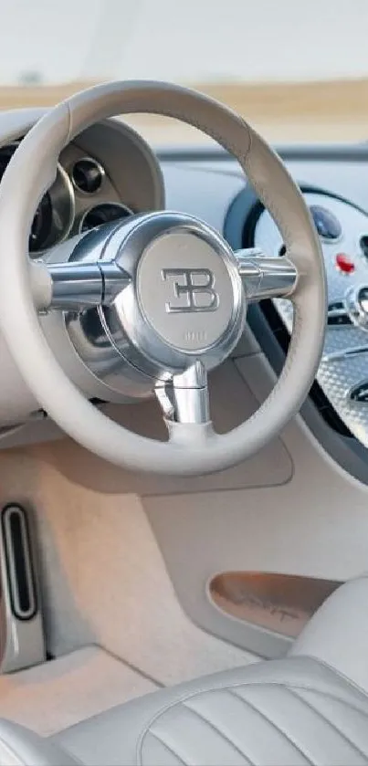 Luxury car interior with silver steering wheel and elegant design.