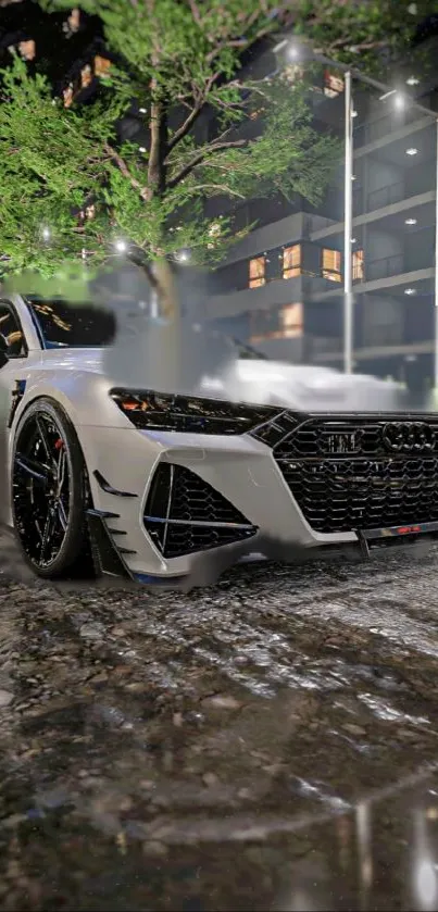 Sleek white luxury car on a rainy city street at night.