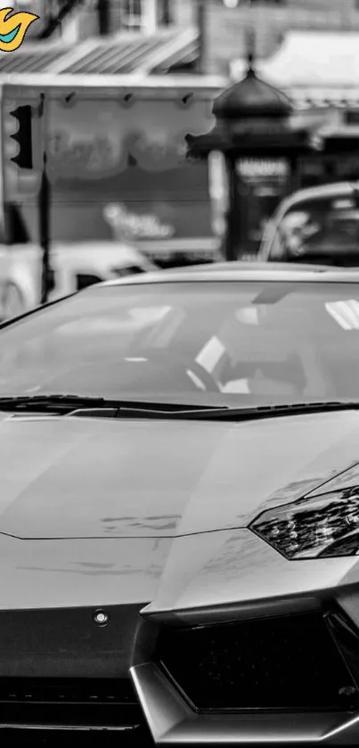 Black and white luxury car on an urban street.