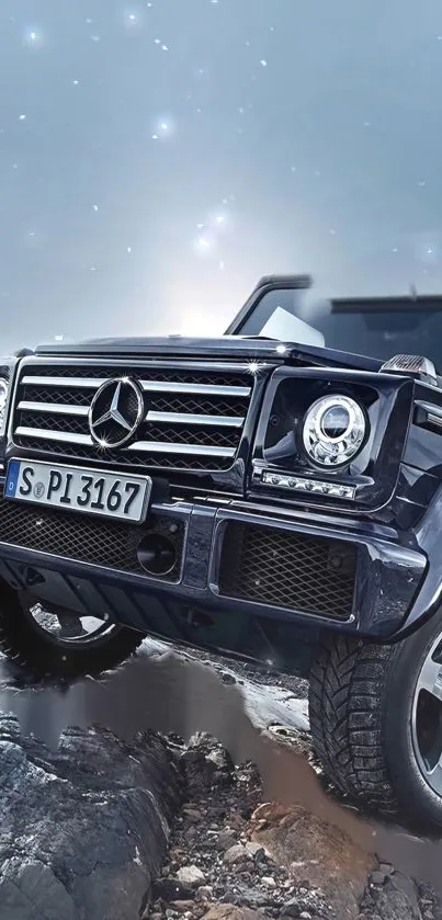 Luxury car on rocky terrain under a starry sky wallpaper.