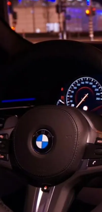 BMW steering wheel against urban lights background