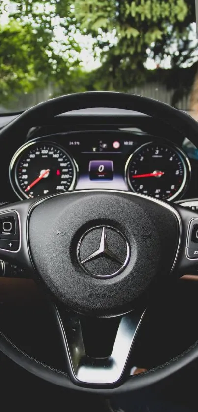 Luxury car steering wheel with sleek, modern design and high-quality detailing.