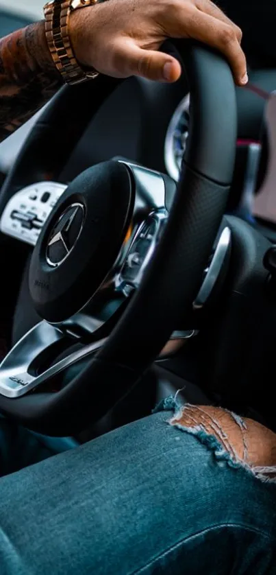 Close-up of a luxury car steering wheel and controls.