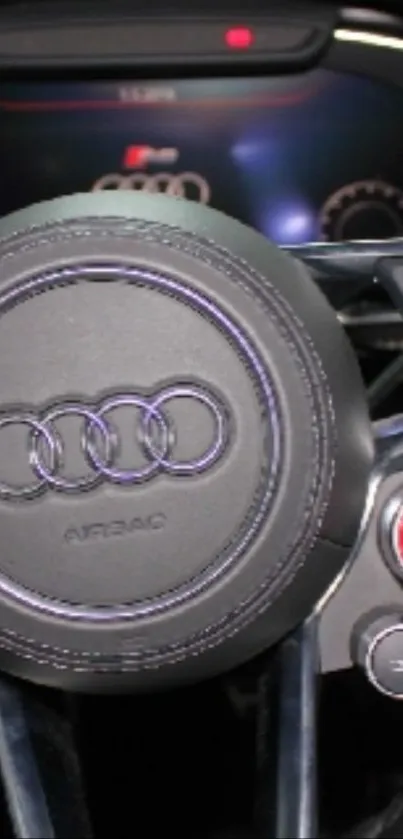 Luxury car steering wheel with controls and start button in focus.