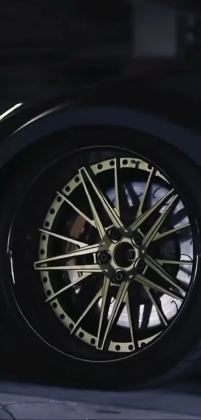 Close-up of a luxury car wheel featuring gold and black design.