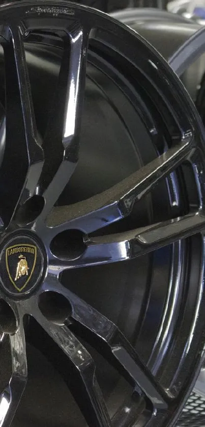 Sleek and glossy car wheels showcased on a display rack.