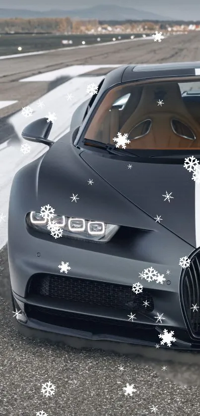 Luxury car with snowflakes on a runway background.