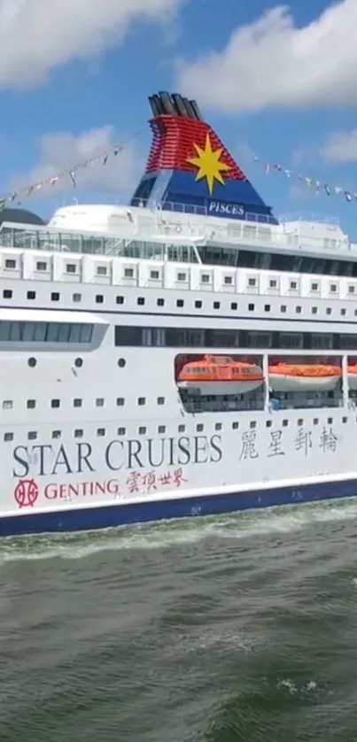 Luxury cruise ship sailing under clear blue sky.