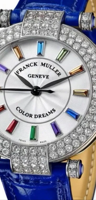 Luxury diamond watch with colorful accents and blue leather strap.