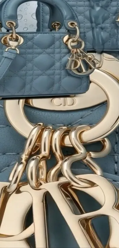 Luxury handbag with gold accents on blue quilted background.