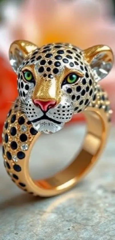 Gold leopard ring with green eyes on a colorful background