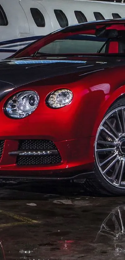 Elegant red luxury sports car in a hangar with reflection.