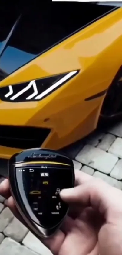 Yellow sports car with digital key, showcasing sleek design and technology.