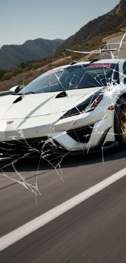 Luxury sports car on highway with shattered glass effect.