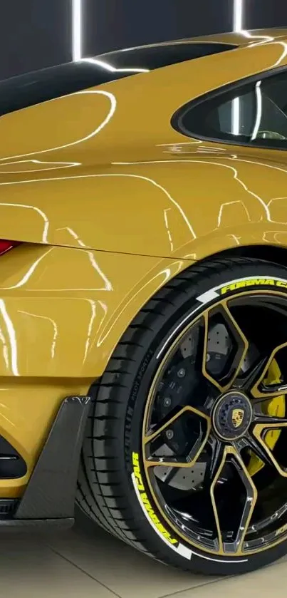 Luxury sports car with glossy yellow finish and detailed wheel view.