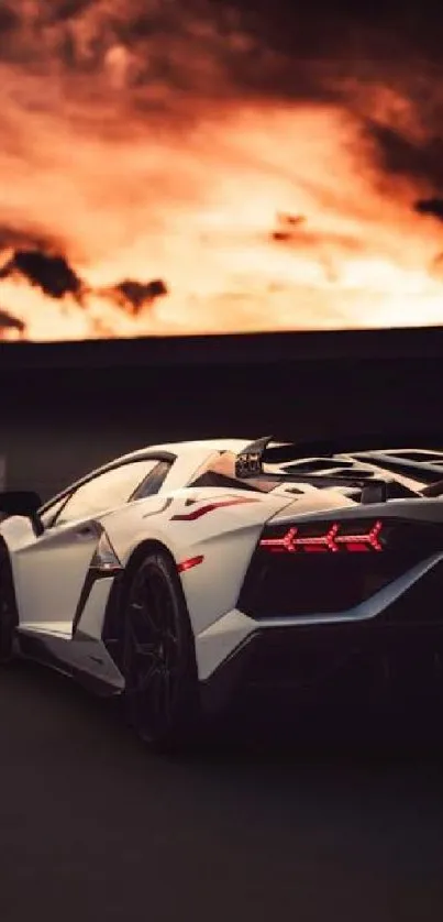 White sports car with sunset backdrop, perfect for luxury wallpaper.