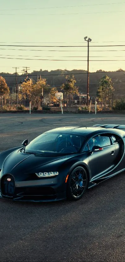 Sleek black luxury sports car in scenic setting.