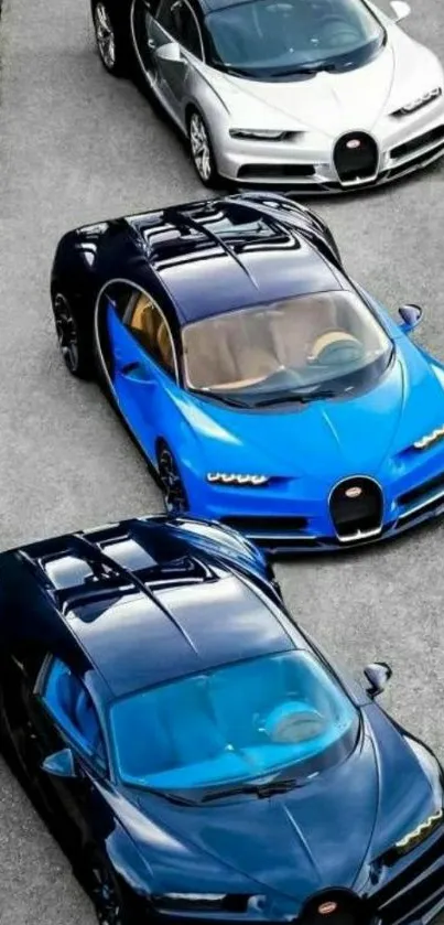 Trio of luxury sports cars on track; sleek design and bold colors