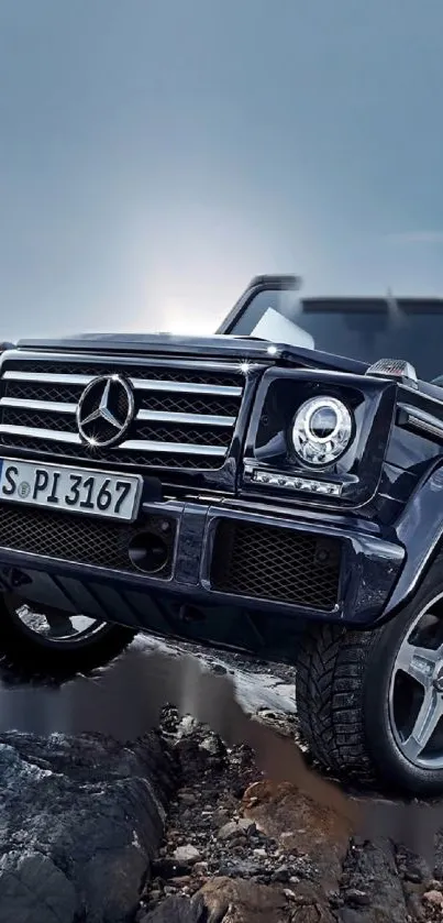 Luxury SUV traversing rocky terrain in stunning wallpaper.