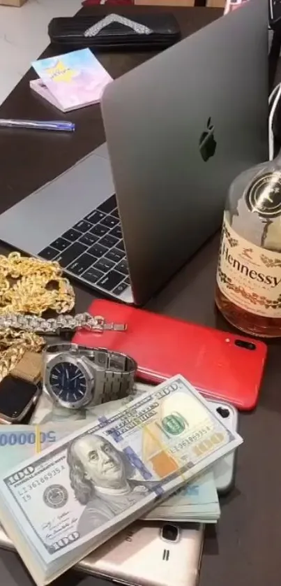 Luxury lifestyle setup with gadgets and whiskey.