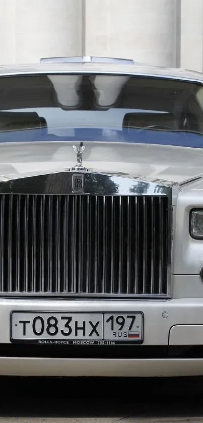 Front view of a luxurious white car with elegant design.